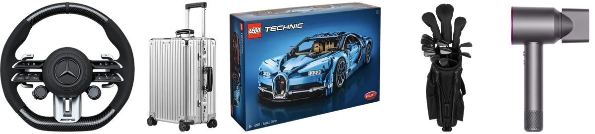 Volante, valigia in alluminio, set LEGO Technic, mazze da golf e asciugacapelli